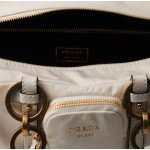 A medium-sized white women\'s handbag with a classic long-handled design from the PRADA Dangle brand